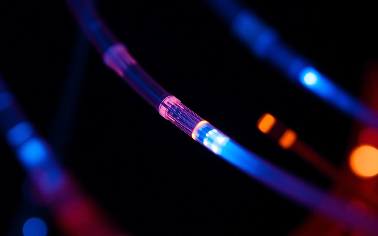 Glowing fiber optic strands transmitting data